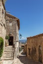 Typical for vernacular architecture buildings, constructions, streets of restored old village Lacoste under blue sky,ÃÂ Vaucluse,